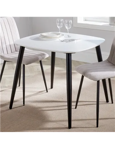 white painted top with black tapered legs